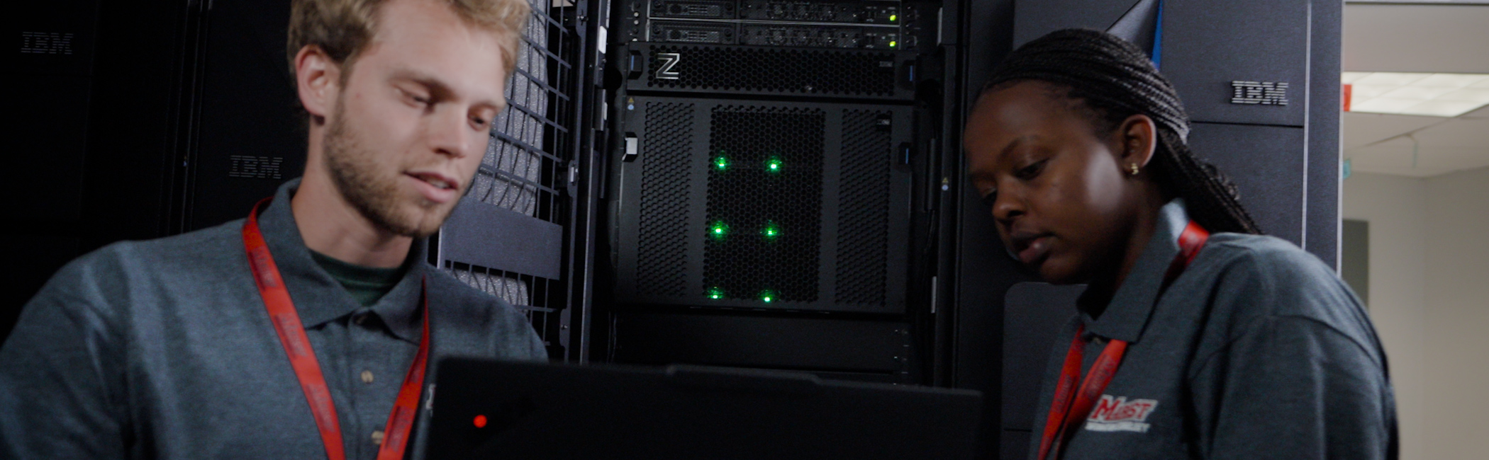 Zooming in on the IBM Z mainframe with students plugging in cables